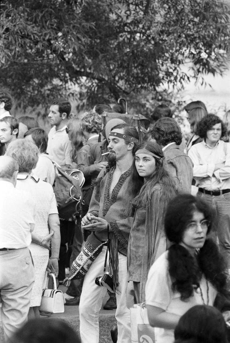 Couple in the crowd at the 1970 Mariposa Folk Festival on Toronto Island. Image no. ASC06192.