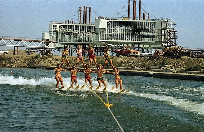 Historic photo from Saturday, August 29, 1970 - Ontario Place pavilion pods under construction in background of waterskiing pyramid - CNE Aquarama show in Ontario Place